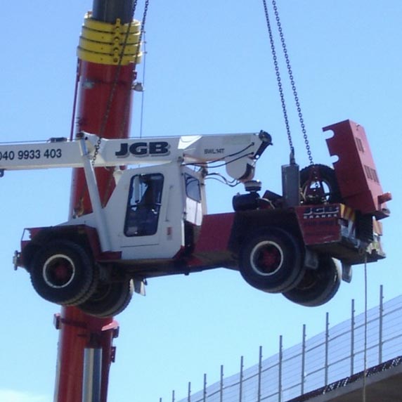 Lifting a smaller crane at the Mt Henry Bridge Duplication